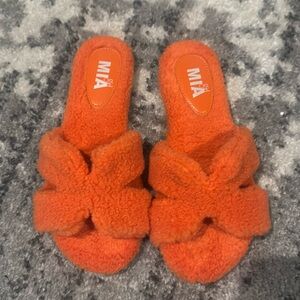 Orange fuzzy sandals